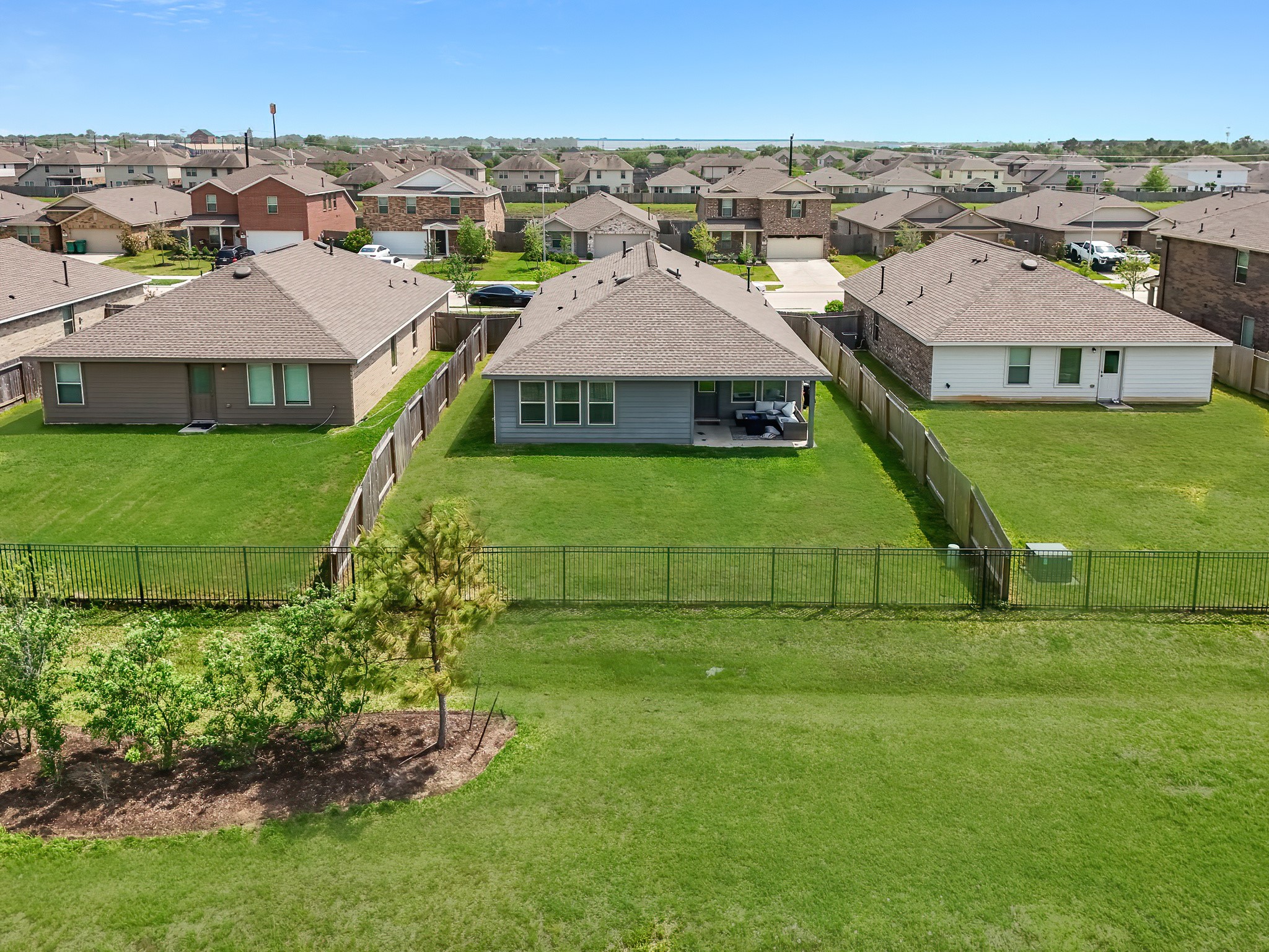 444 Maple Bend Lane La Marque, TX 77568 - Photo 30 of 32 an aerial view of a house with a garden