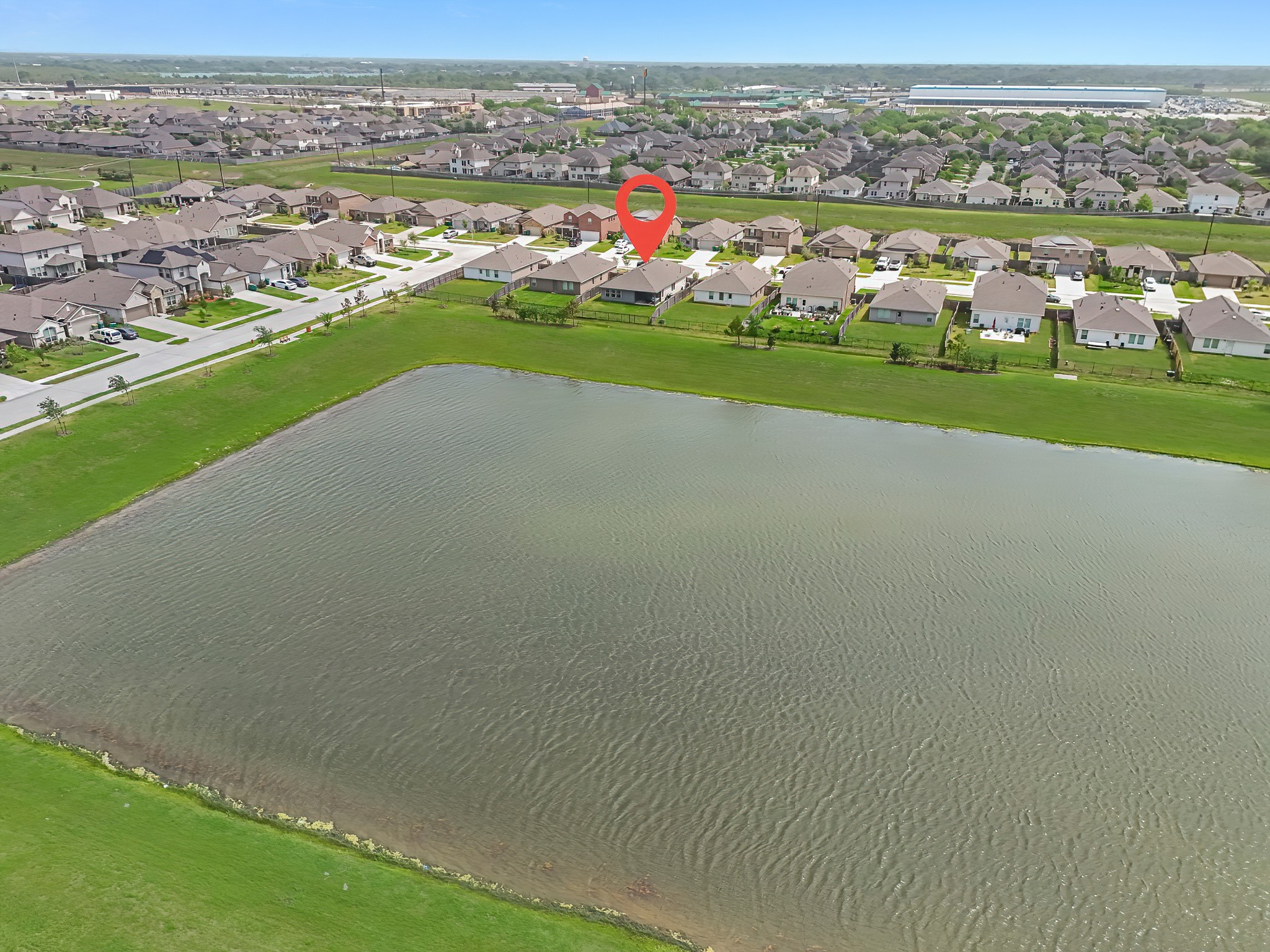 444 Maple Bend Lane La Marque, TX 77568 - Photo 32 of 32 an aerial view of a city with lots of residential buildings ocean and mountain view in back
