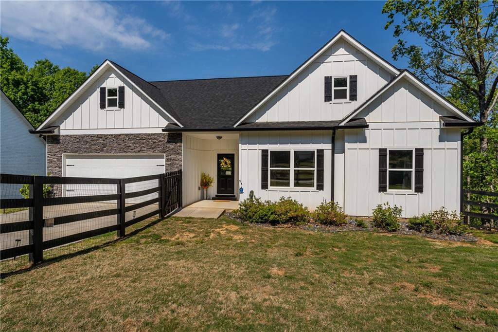 271 Moorings Run Jasper, GA 30143 - Photo 1 of 34 a front view of a house with garden