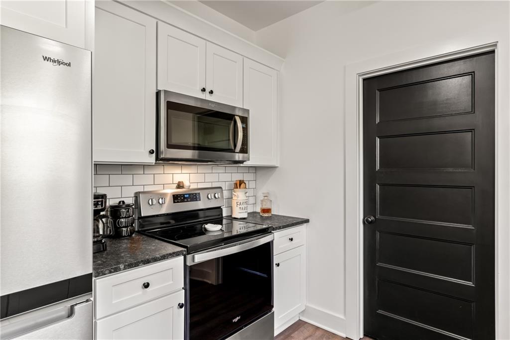 271 Moorings Run Jasper, GA 30143 - Photo 11 of 34 a kitchen with a stove and a microwave