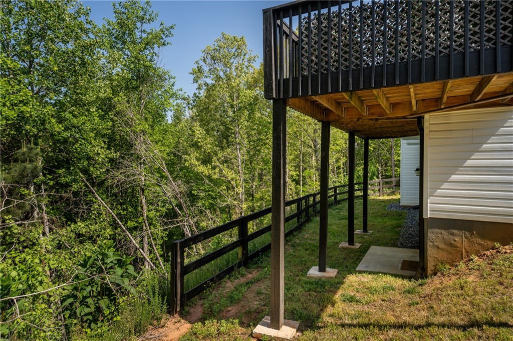 271 Moorings Run Jasper, GA 30143 - Photo 29 of 34 a view of balcony with two chairs and a table