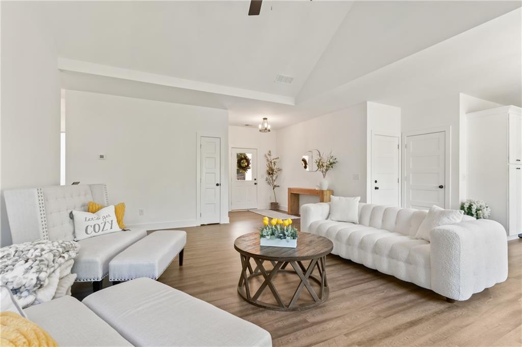 271 Moorings Run Jasper, GA 30143 - Photo 3 of 34 a living room with furniture and wooden floor