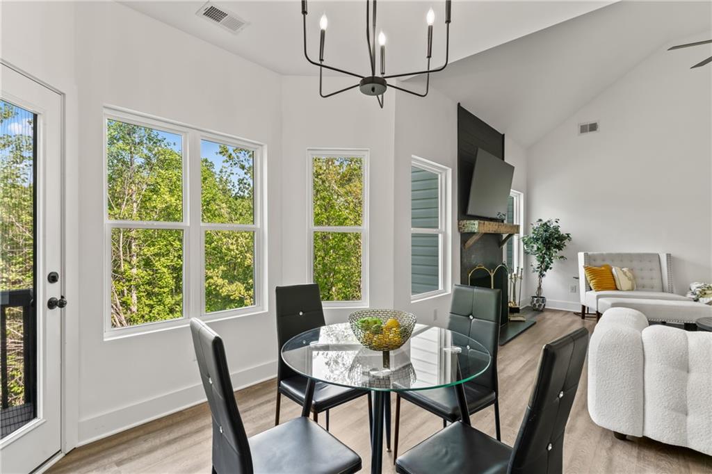 271 Moorings Run Jasper, GA 30143 - Photo 8 of 34 a view of a dining room with furniture window and wooden floor