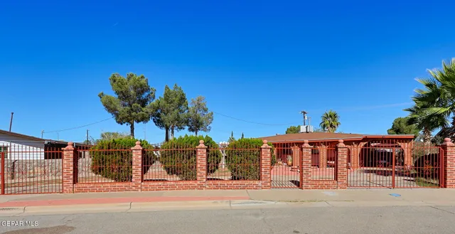 a view of a house with a street