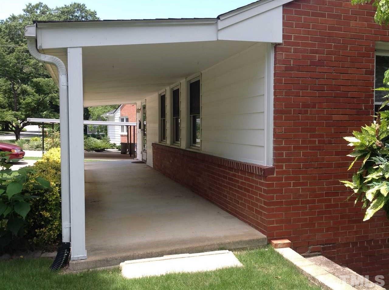 907 Mills Street Raleigh, NC 27608 - Photo 2 of 13 a view of entrance door of the house