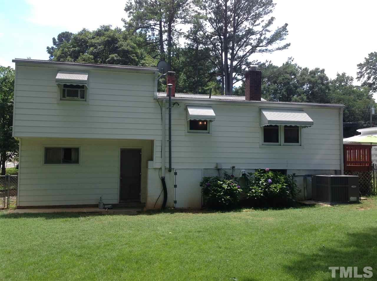 907 Mills Street Raleigh, NC 27608 - Photo 5 of 13 a view of front of a house with a yard