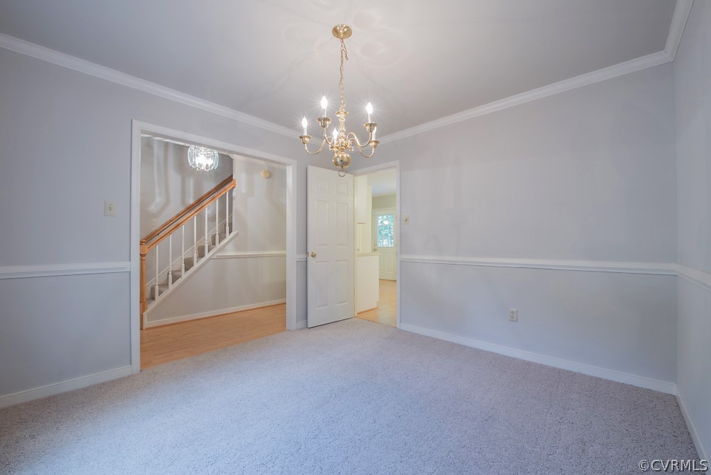 10400 White Rabbit Road North Chesterfield, VA 23235 - Photo 15 of 50 a view of an empty room with chandelier and stairs