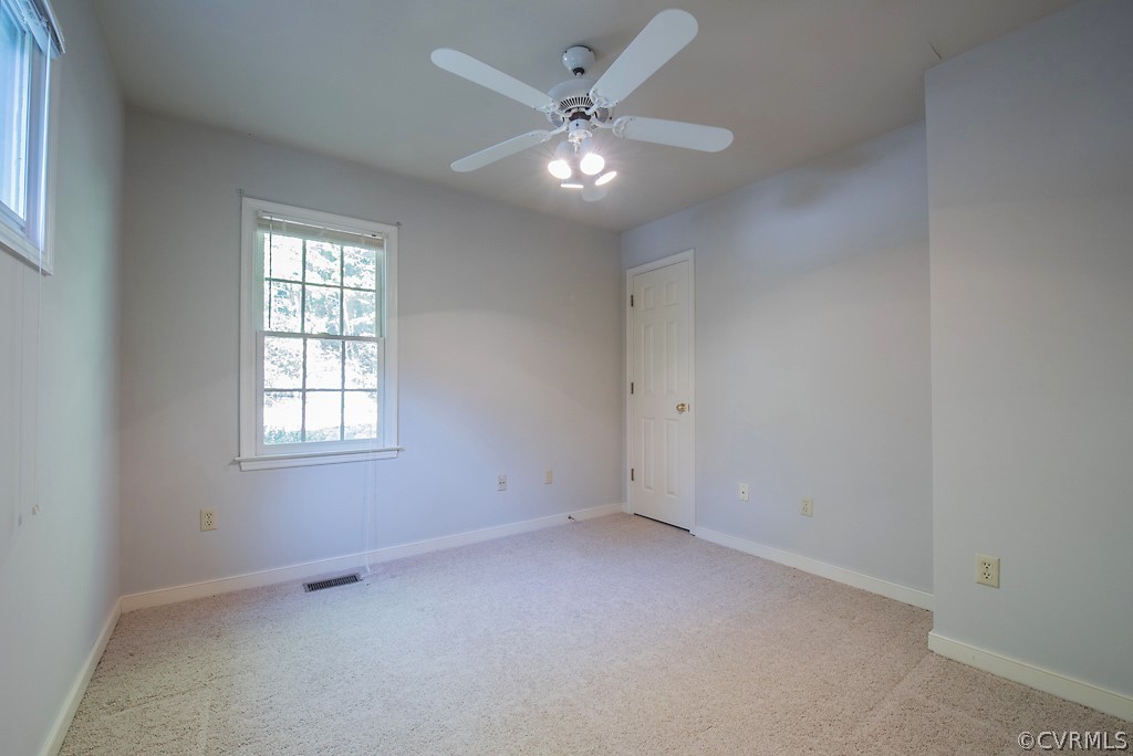 10400 White Rabbit Road North Chesterfield, VA 23235 - Photo 29 of 50 a view of an empty room with a window