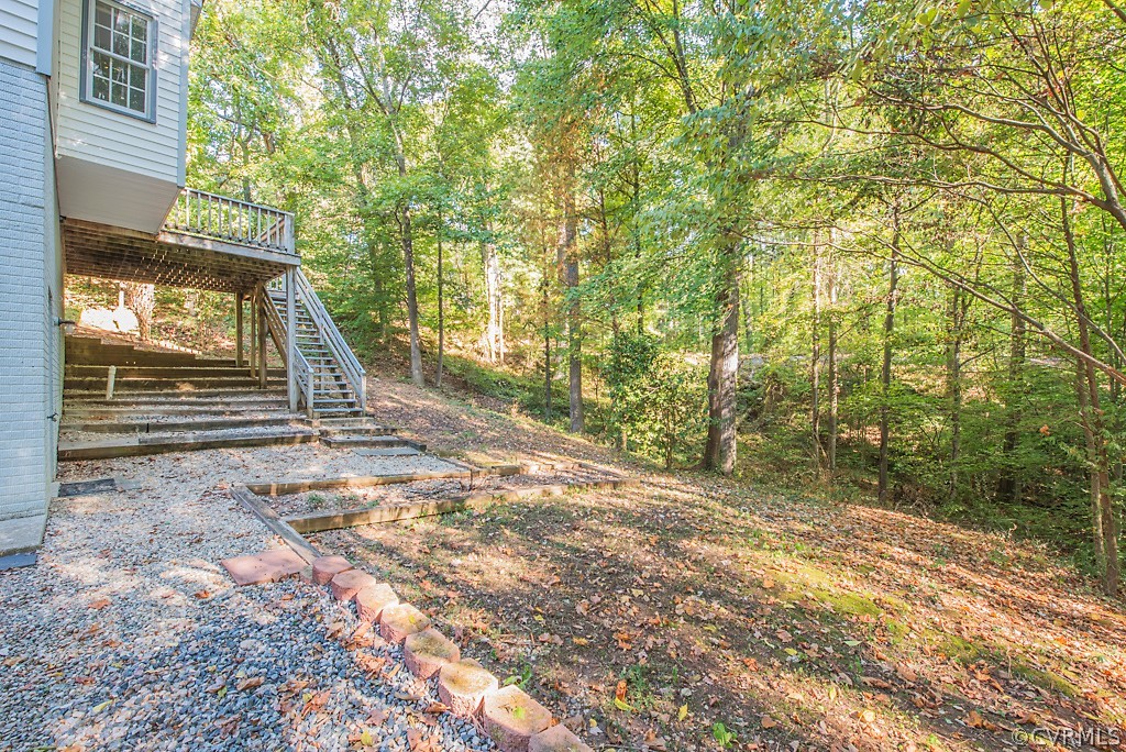 10400 White Rabbit Road North Chesterfield, VA 23235 - Photo 45 of 50 a view of a house with backyard and trees
