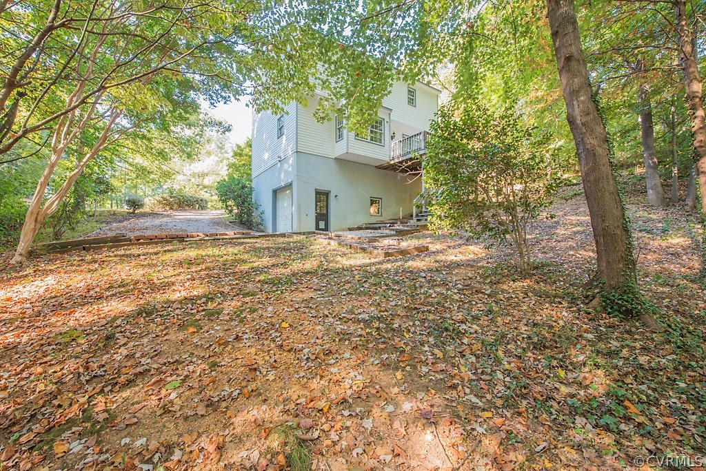 10400 White Rabbit Road North Chesterfield, VA 23235 - Photo 46 of 50 a view of a house with a yard and large trees