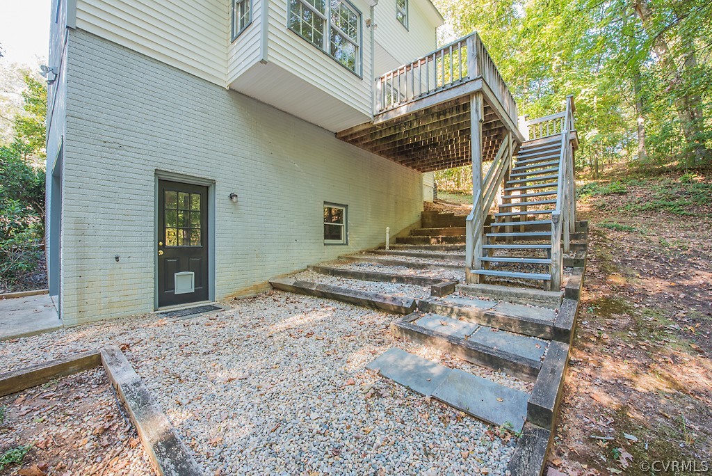10400 White Rabbit Road North Chesterfield, VA 23235 - Photo 48 of 50 a view of a house with a yard and wooden fence
