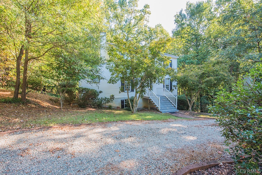 10400 White Rabbit Road North Chesterfield, VA 23235 - Photo 6 of 50 a view of a house with large trees