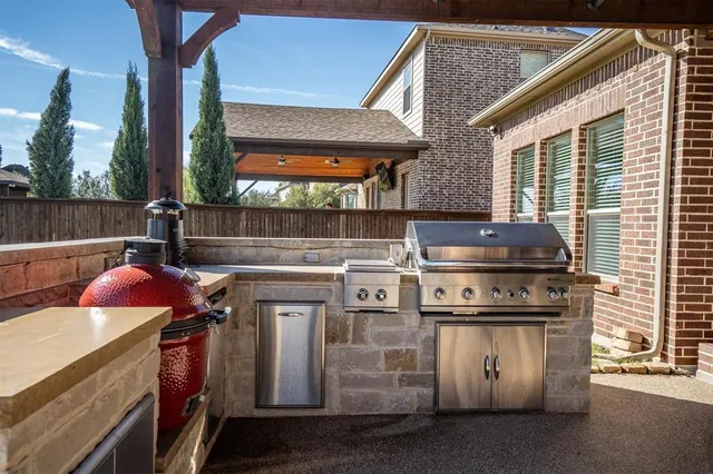 a kitchen with a stove and a microwave