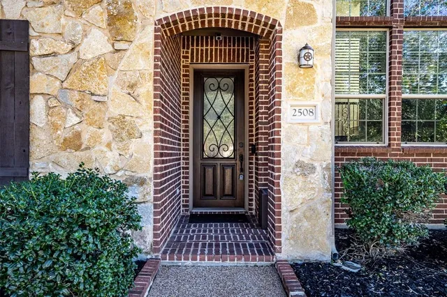 a front view of a house with a door