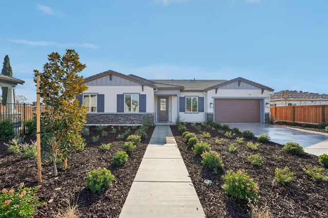 a front view of house with yard