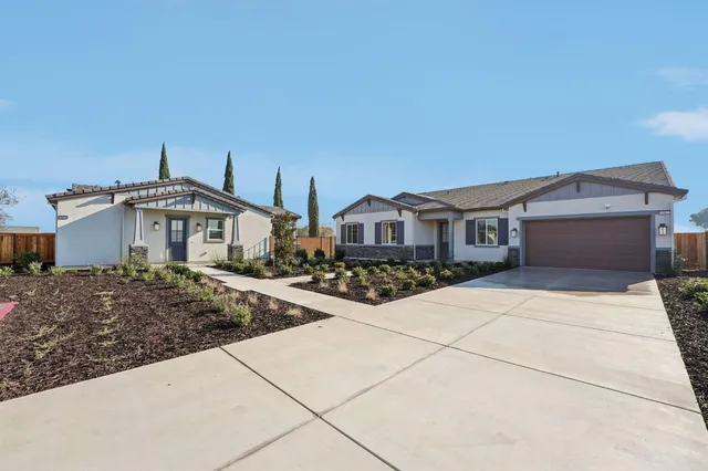a front view of house with yard