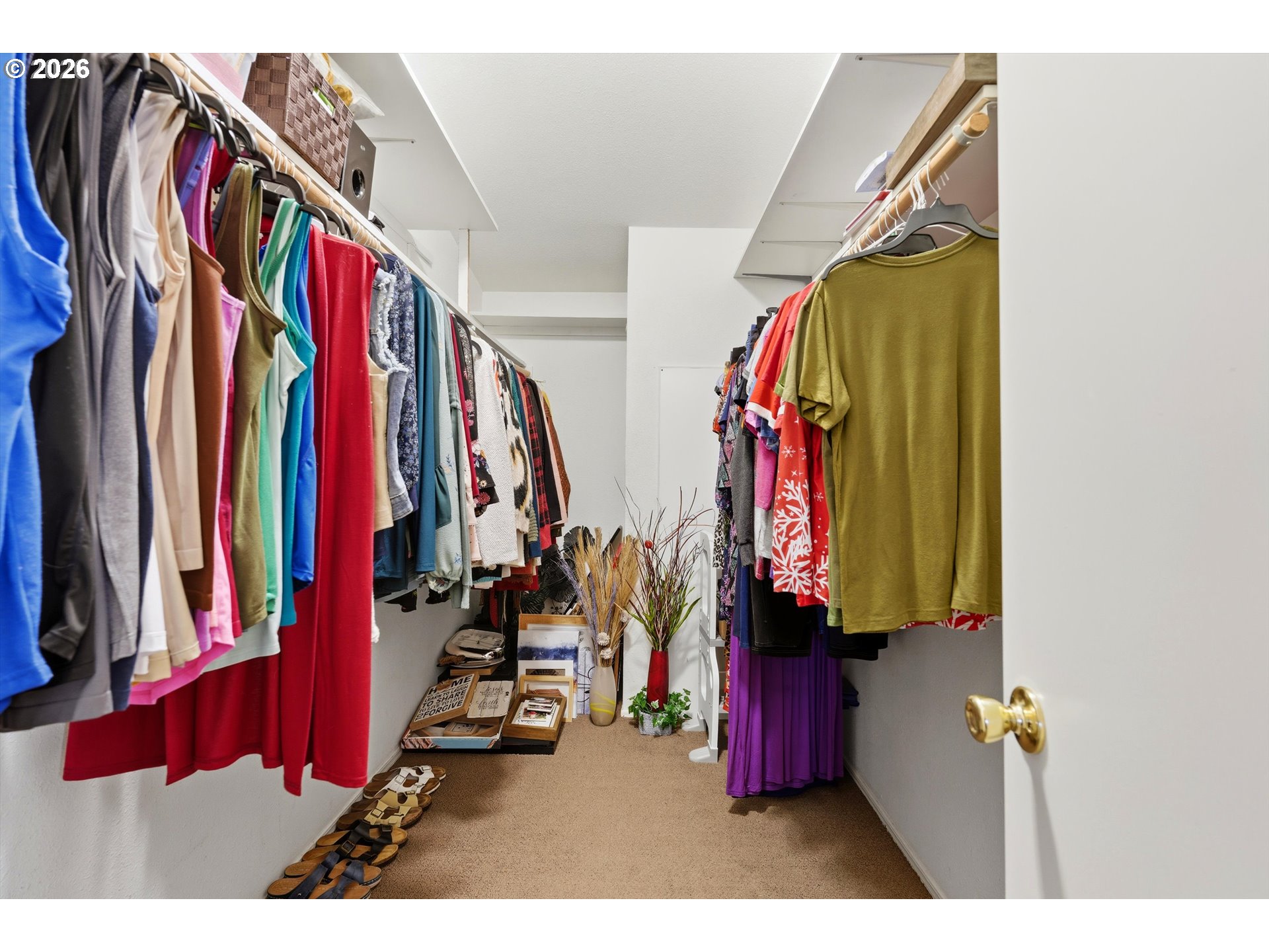 369 Gun Club Road, Unit 88 Woodland, WA 98674 - Photo 11 of 17 a view of walk in closet with clothes