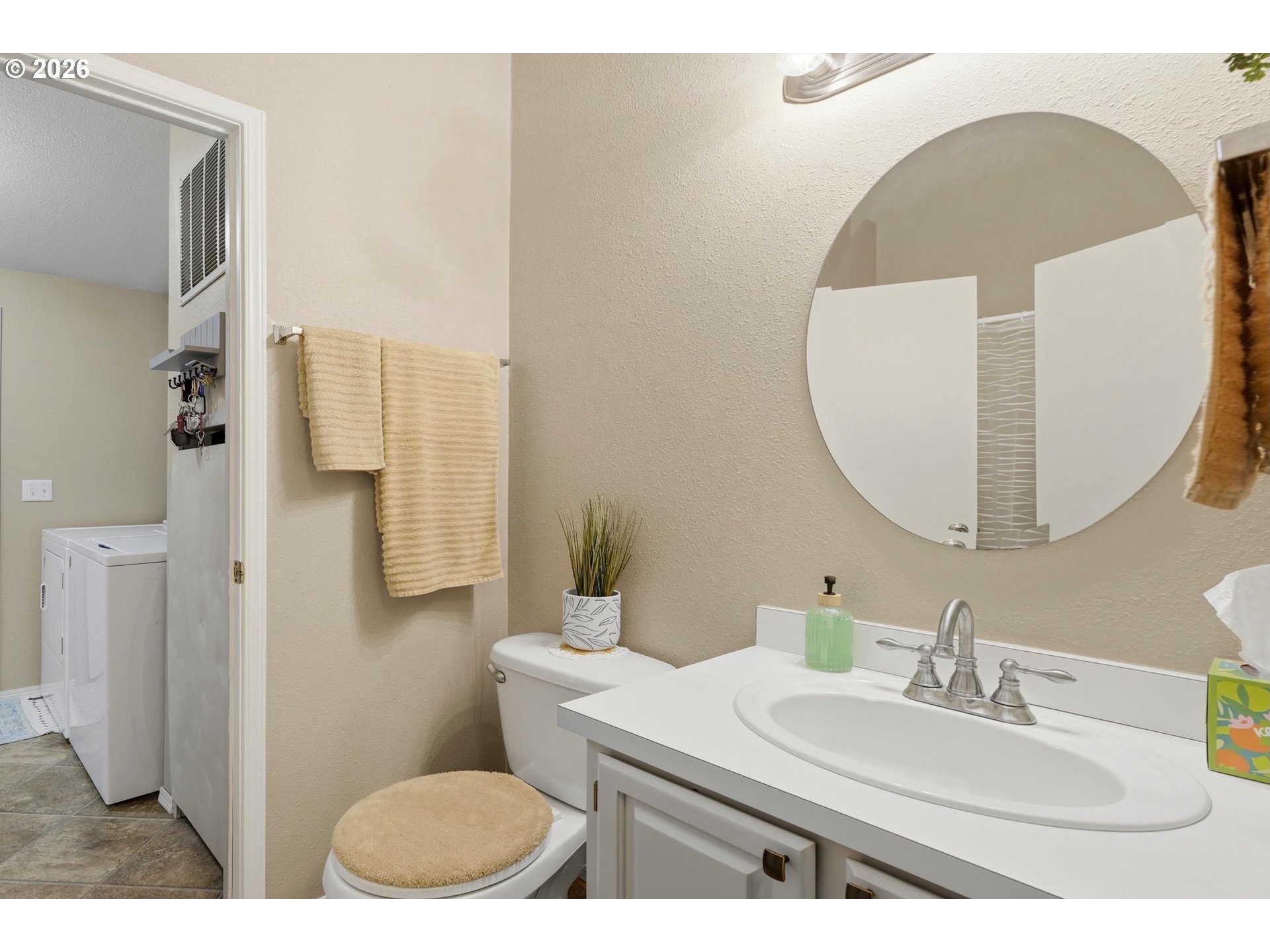 369 Gun Club Road, Unit 88 Woodland, WA 98674 - Photo 15 of 17 a bathroom with a sink toilet and shower