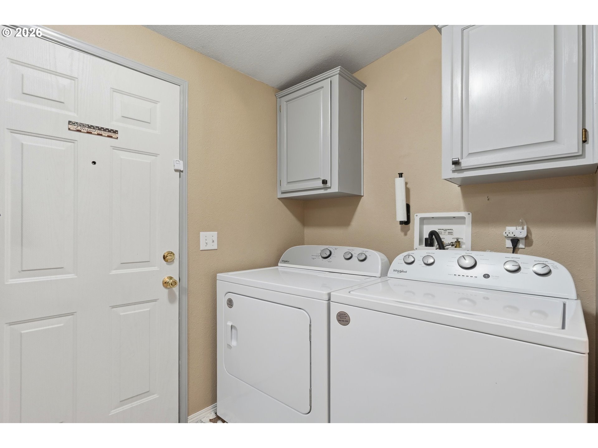 369 Gun Club Road, Unit 88 Woodland, WA 98674 - Photo 16 of 17 a utility room with dryer and washer