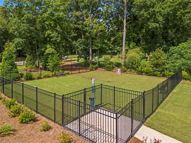 a view of a balcony and trees