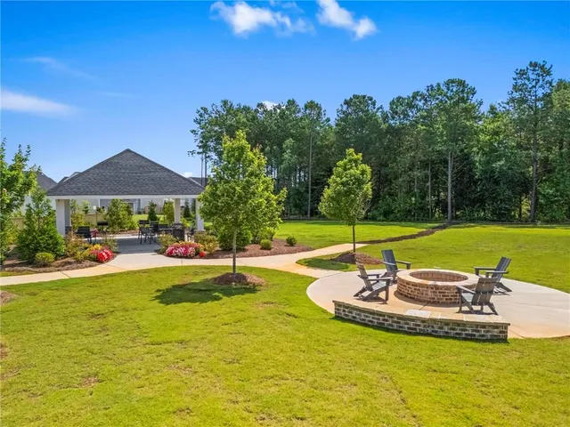 a view of a swimming pool with a garden