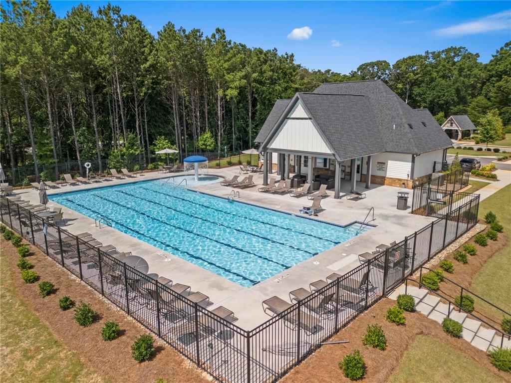 113 Poppy Street McDonough, GA 30253 - Photo 33 of 36 a view of a house with backyard and sitting area