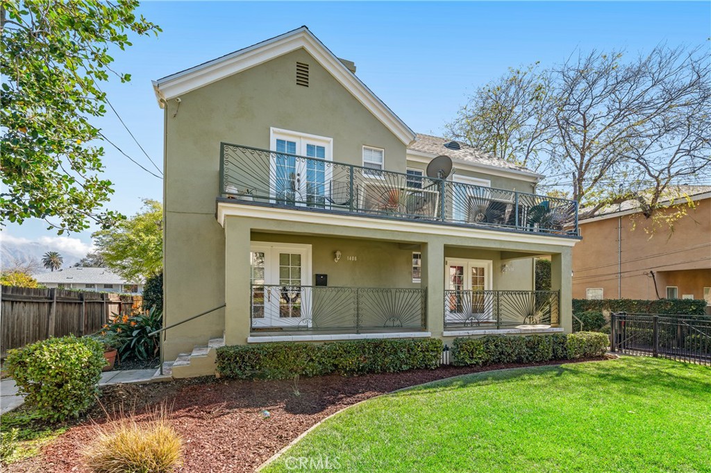 1400 Garfield Avenue Pasadena, CA 91104 - Photo 1 of 27 a front view of a house with a garden and plants