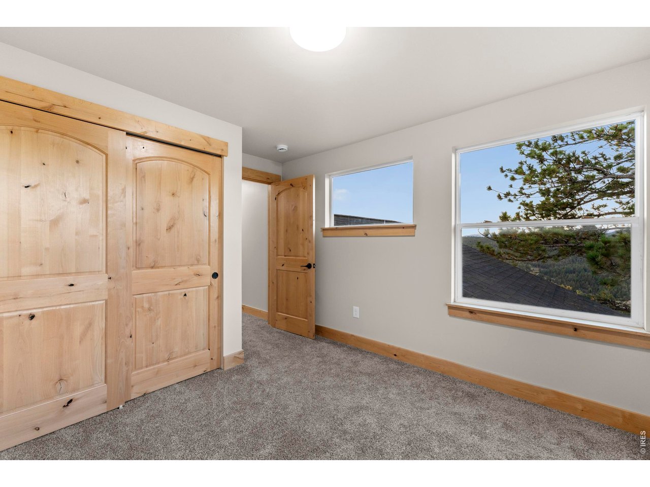 1074 Caddo Road Red Feather Lakes, CO 80545 - Photo 25 of 34 Upstairs Bedroom 2