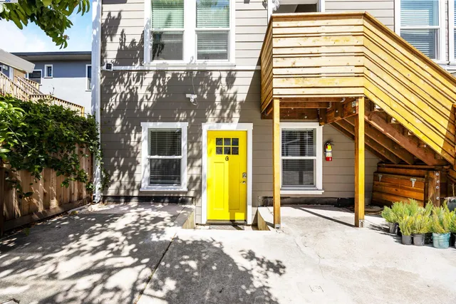 a front view of a house with a glass door