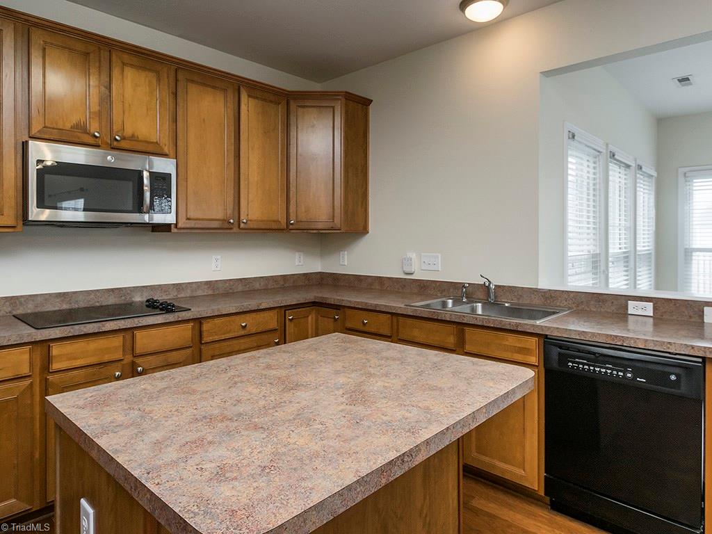 3709 Lexham Court High Point, NC 27265 - Photo 5 of 30 Island, microwave, cook top