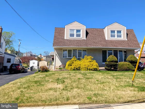 a view of front of a house with a patio