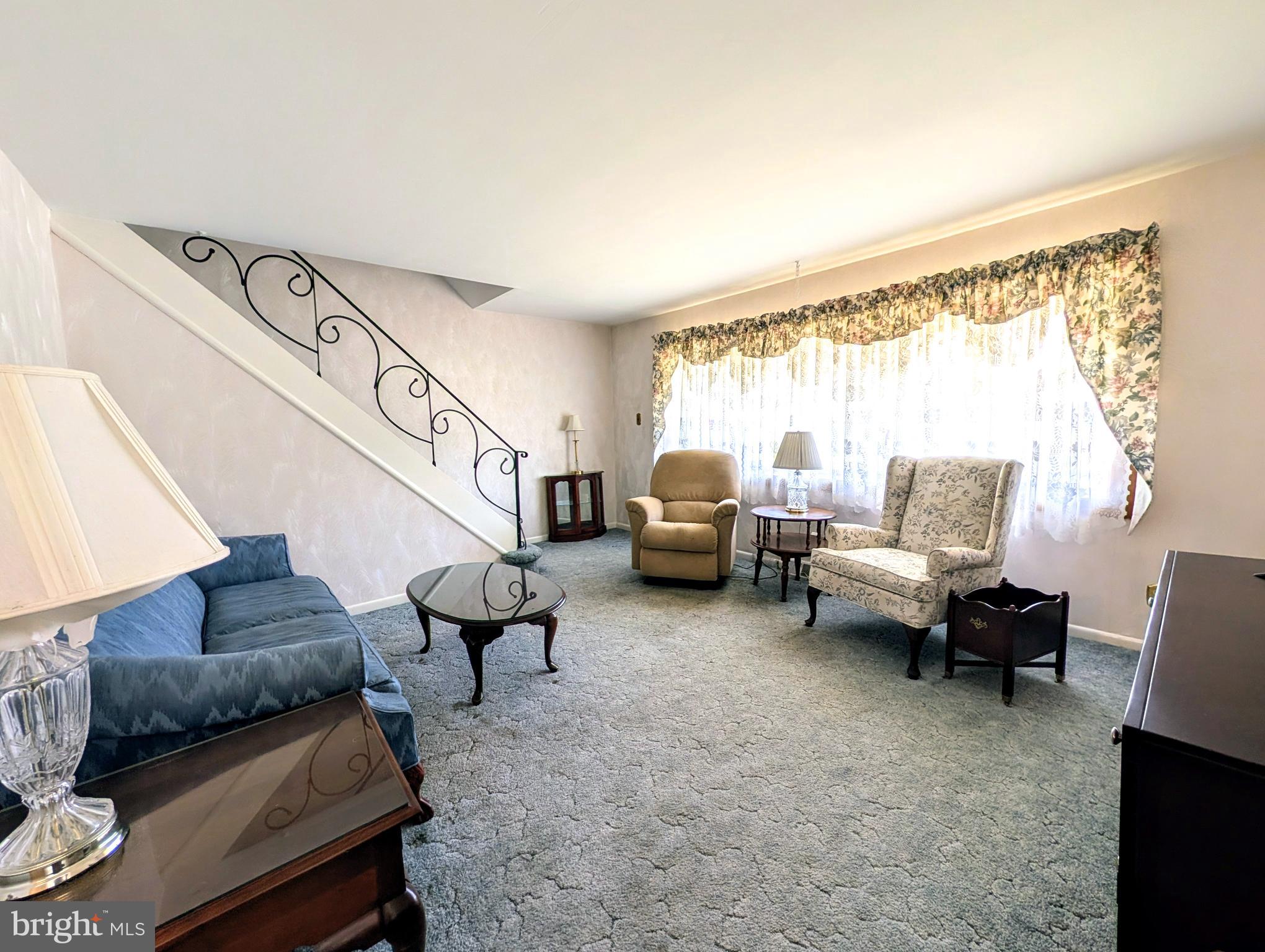 1439 Michigan Avenue Swarthmore, PA 19081 - Photo 11 of 54 a living room with furniture and a couch