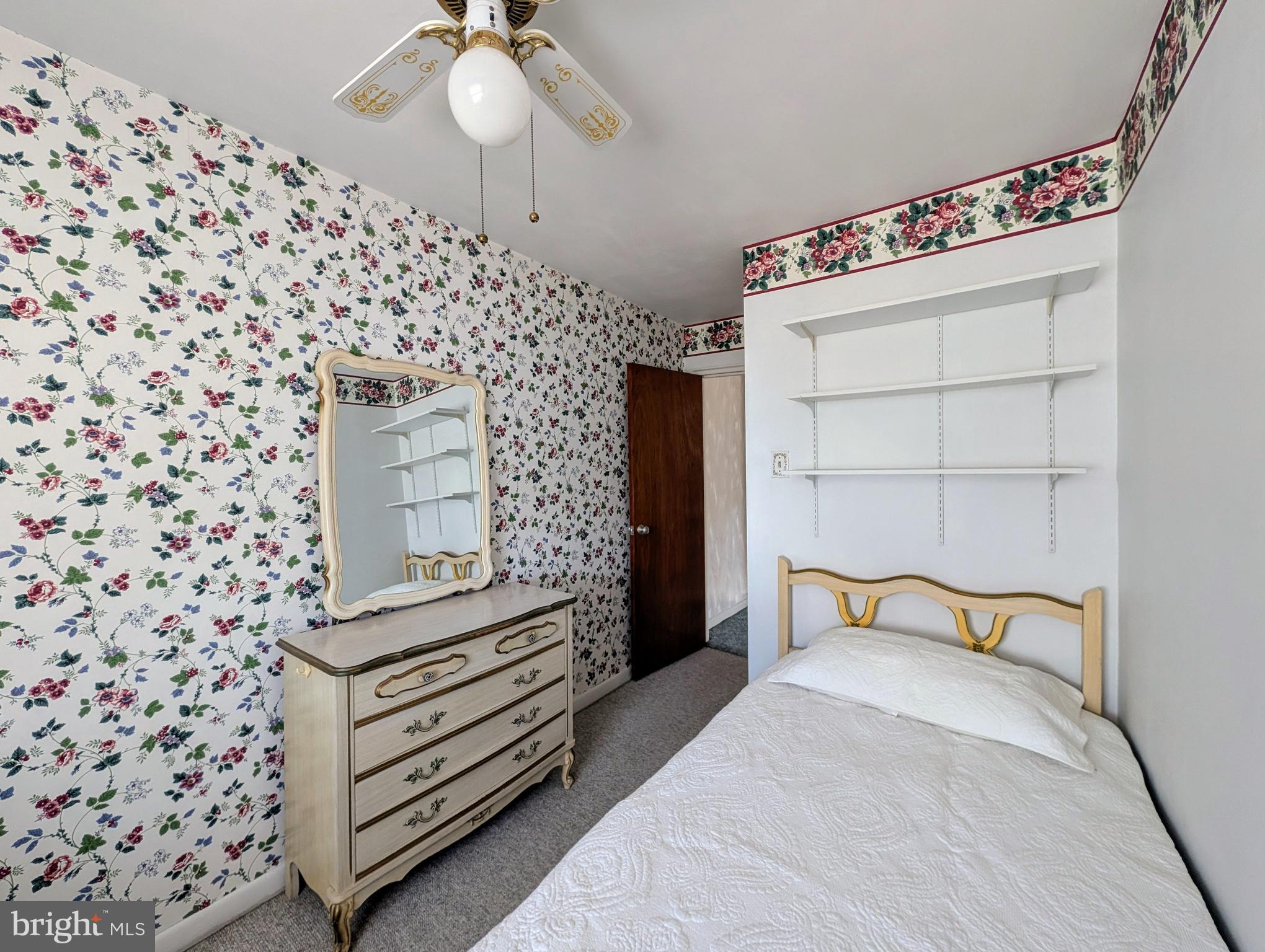 1439 Michigan Avenue Swarthmore, PA 19081 - Photo 17 of 54 a bedroom with a bed and a mirror