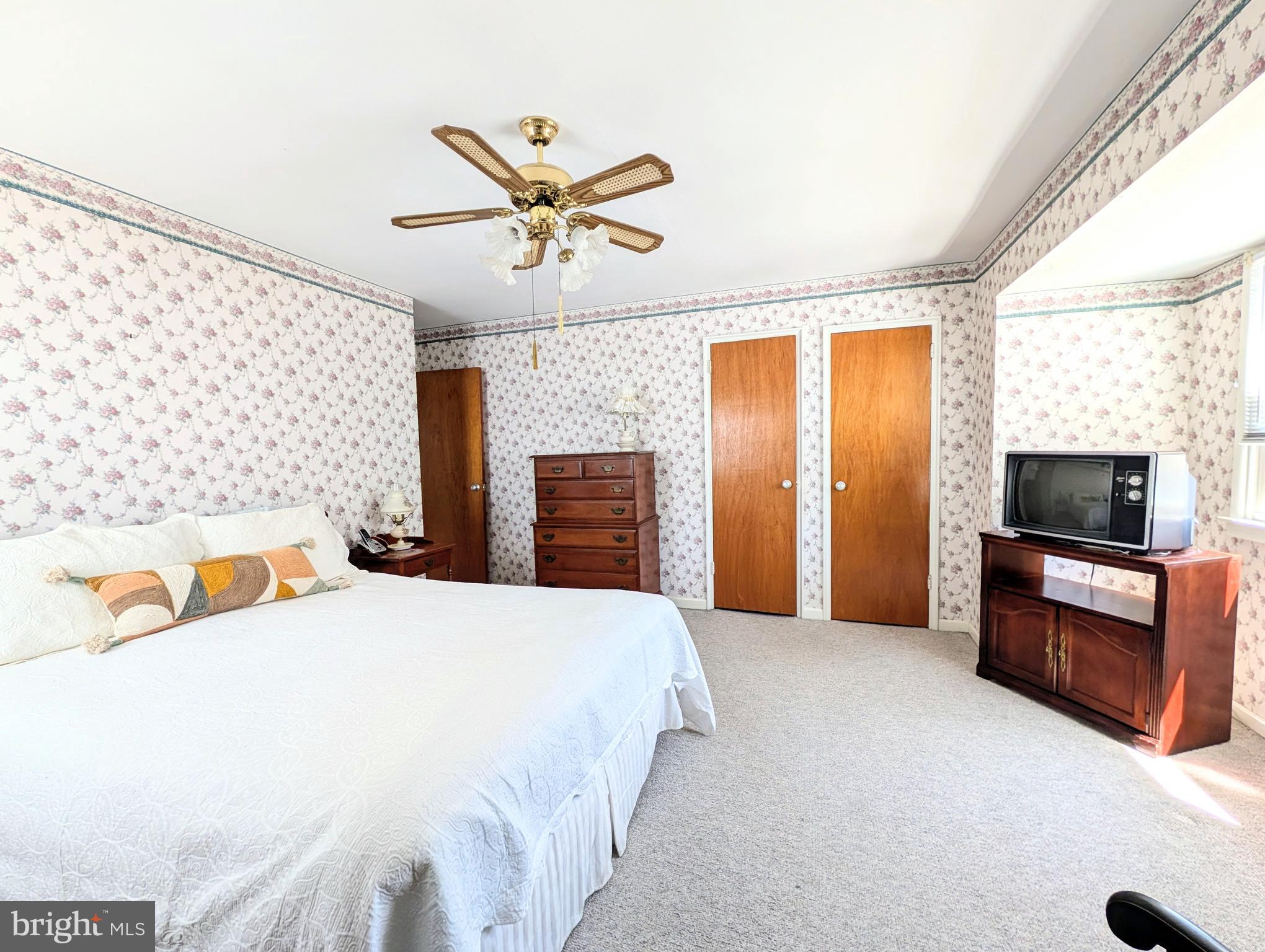 1439 Michigan Avenue Swarthmore, PA 19081 - Photo 21 of 54 a bedroom with a bed and a flat screen tv
