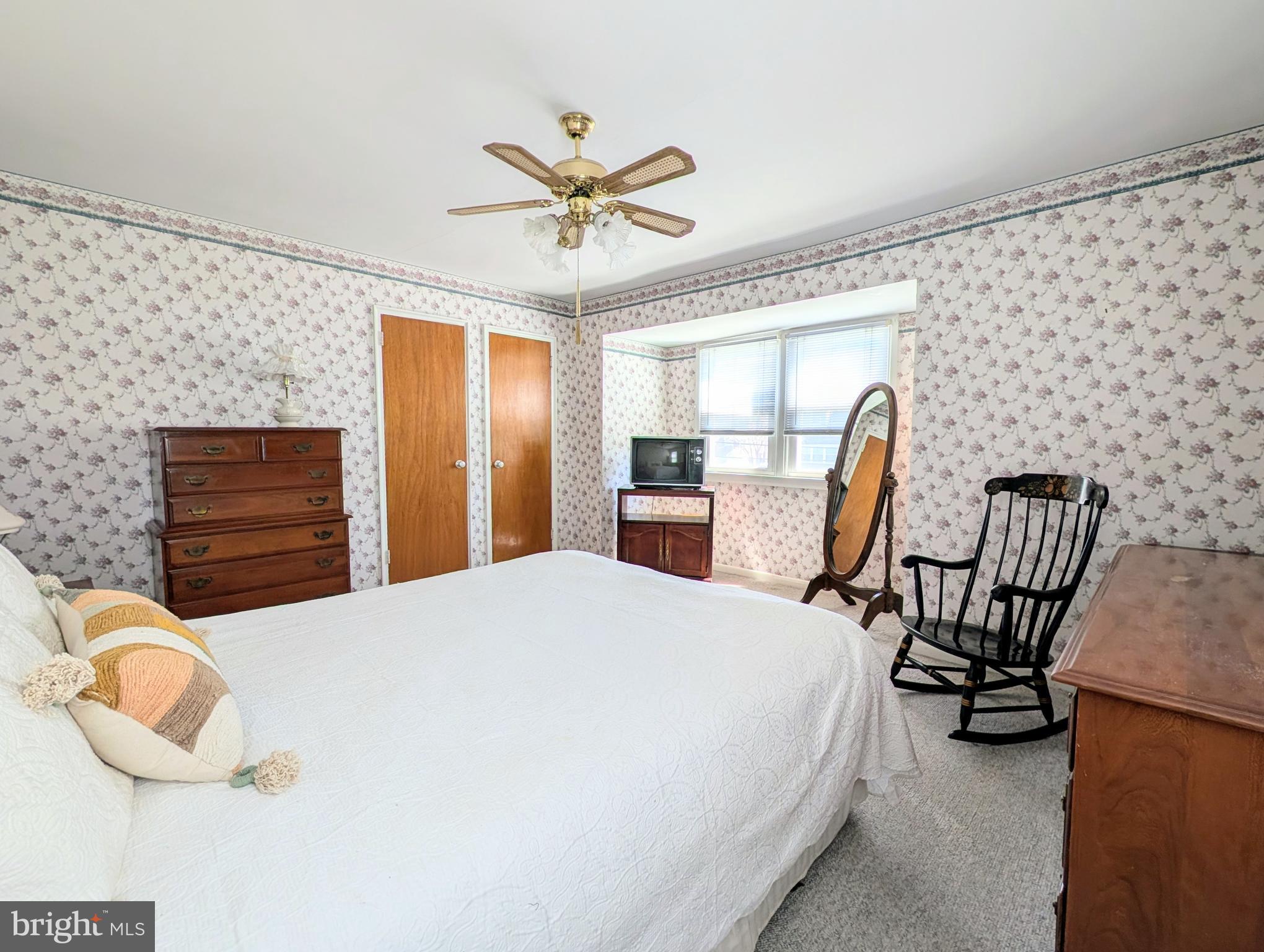 1439 Michigan Avenue Swarthmore, PA 19081 - Photo 22 of 54 a bedroom with a bed a chair and potted plant