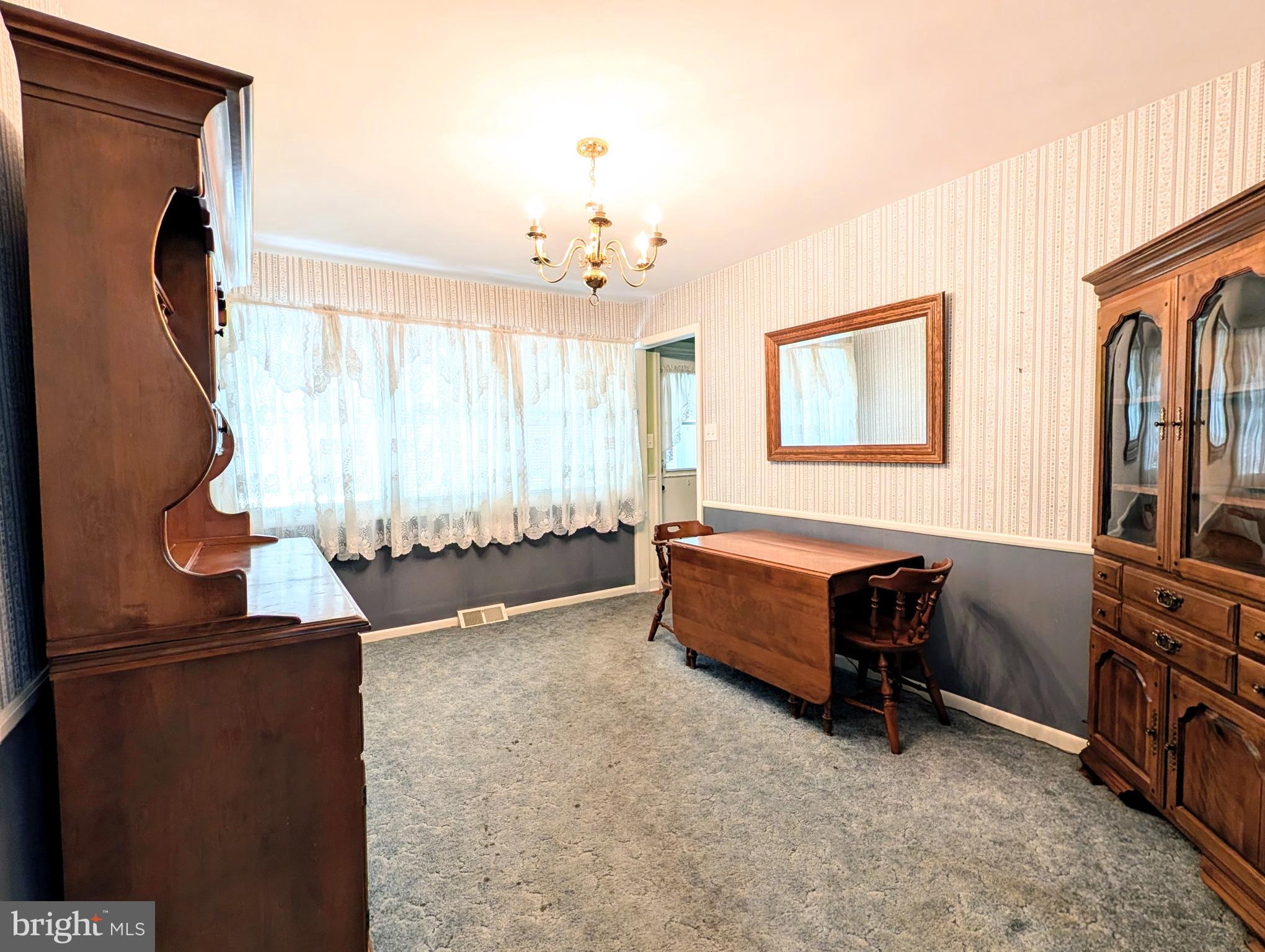 1439 Michigan Avenue Swarthmore, PA 19081 - Photo 32 of 54 a room with furniture and a window