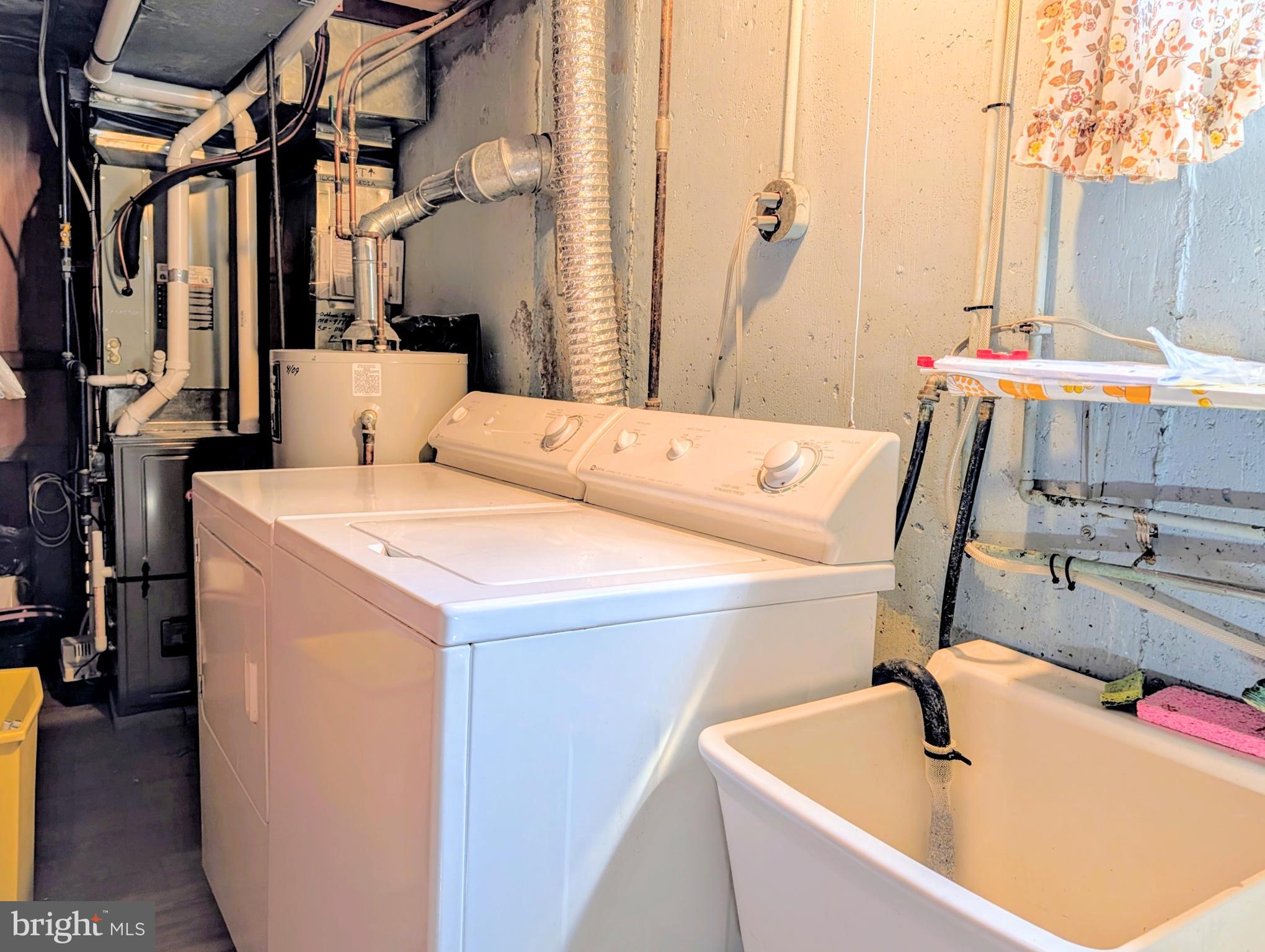 1439 Michigan Avenue Swarthmore, PA 19081 - Photo 48 of 54 a utility room with dryer and washer