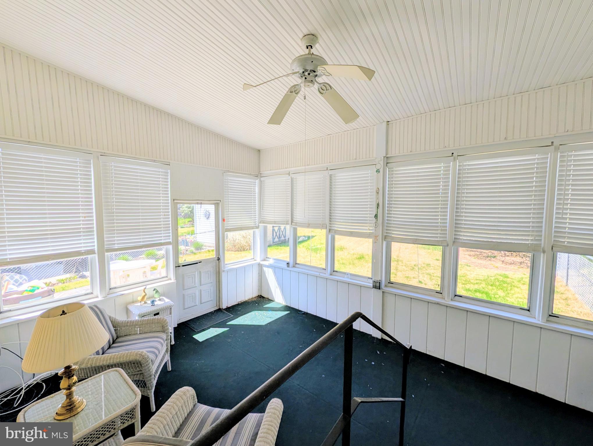 1439 Michigan Avenue Swarthmore, PA 19081 - Photo 50 of 54 a room with lots of furniture and windows