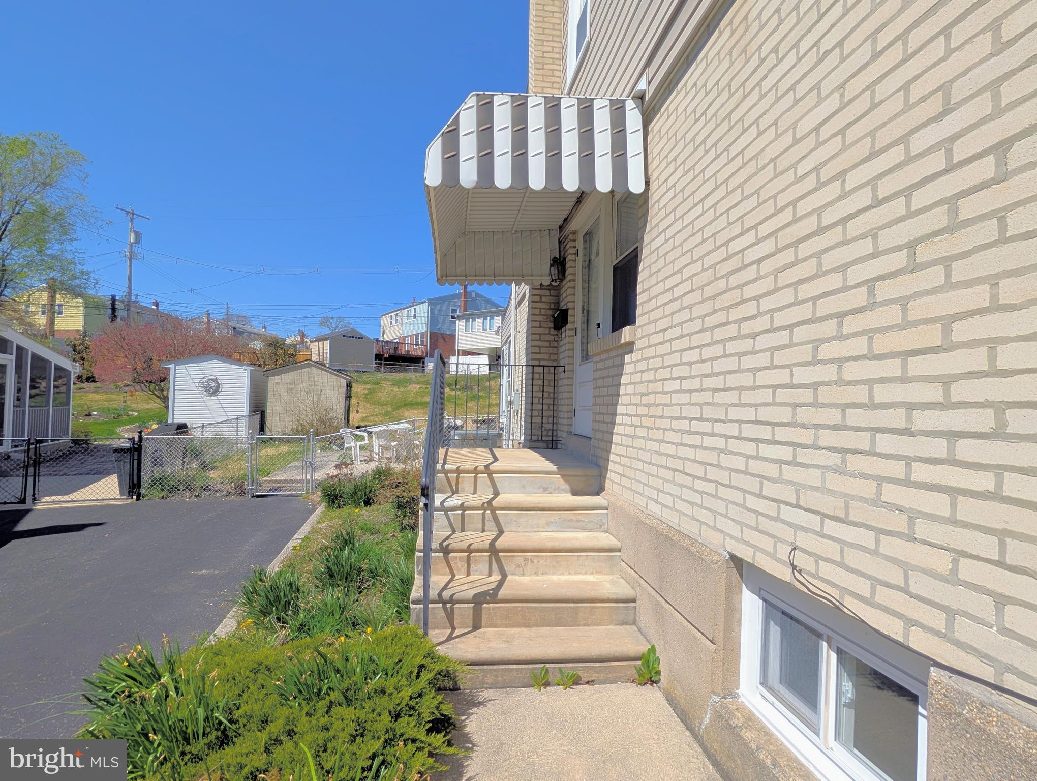 1439 Michigan Avenue Swarthmore, PA 19081 - Photo 54 of 54 a view of a house with a floor to ceiling windows