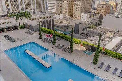 a view of balcony with furniture