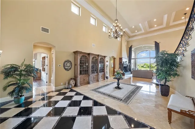 a front view of a house with outdoor seating