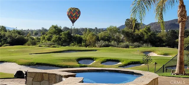 an aerial view of a house with a garden