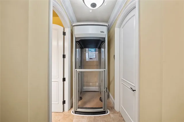 a view of swimming pool with outdoor seating and house in the background