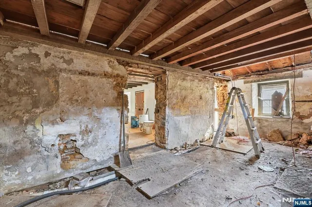 a view of a room with racks on the wall