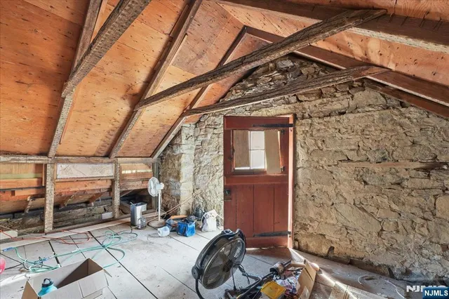 a view of a storage room with furniture