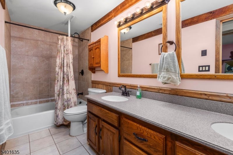 37 Ward Road Blairstown, NJ 07825 - Photo 16 of 28 a bathroom with a granite countertop sink and a mirror