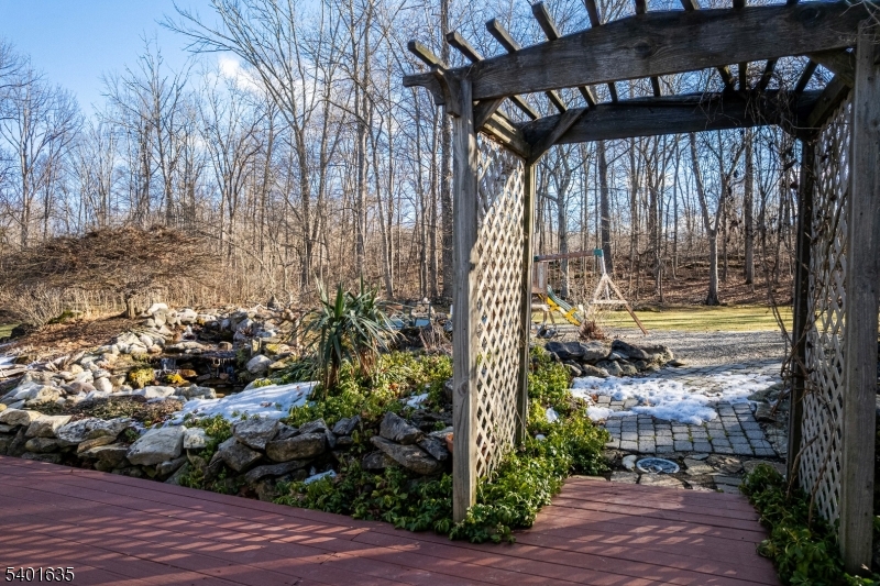 37 Ward Road Blairstown, NJ 07825 - Photo 27 of 28 a view of a porch with a yard