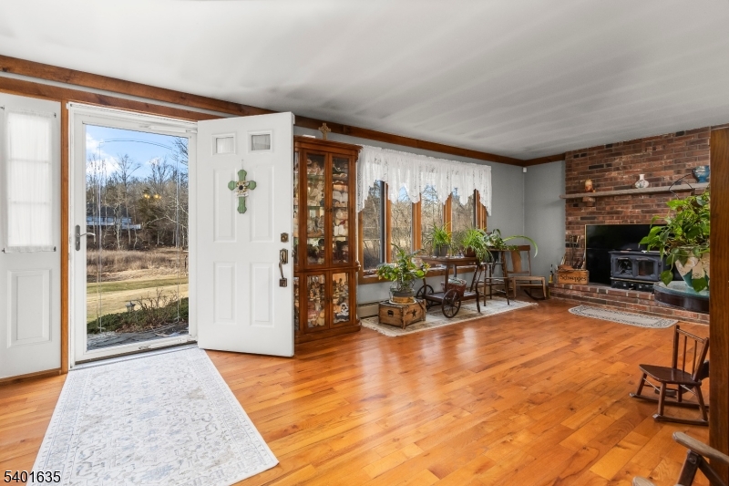 37 Ward Road Blairstown, NJ 07825 - Photo 5 of 28 a view of a livingroom with workspace and a window