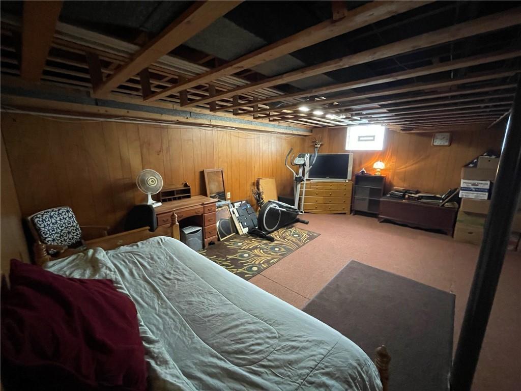 63 Locust Street McKees Rocks, PA 15136 - Photo 15 of 25 a bed room with two bed and a couch