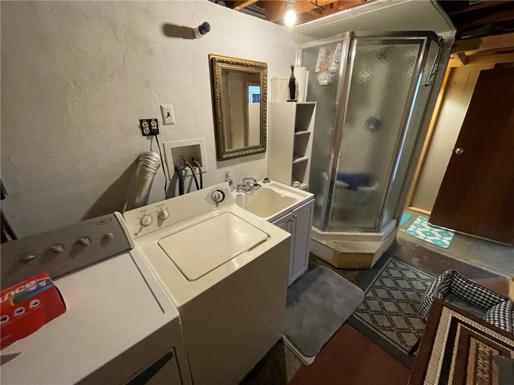 63 Locust Street McKees Rocks, PA 15136 - Photo 20 of 25 a bathroom with a sink and a mirror